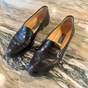 Black leather loafers